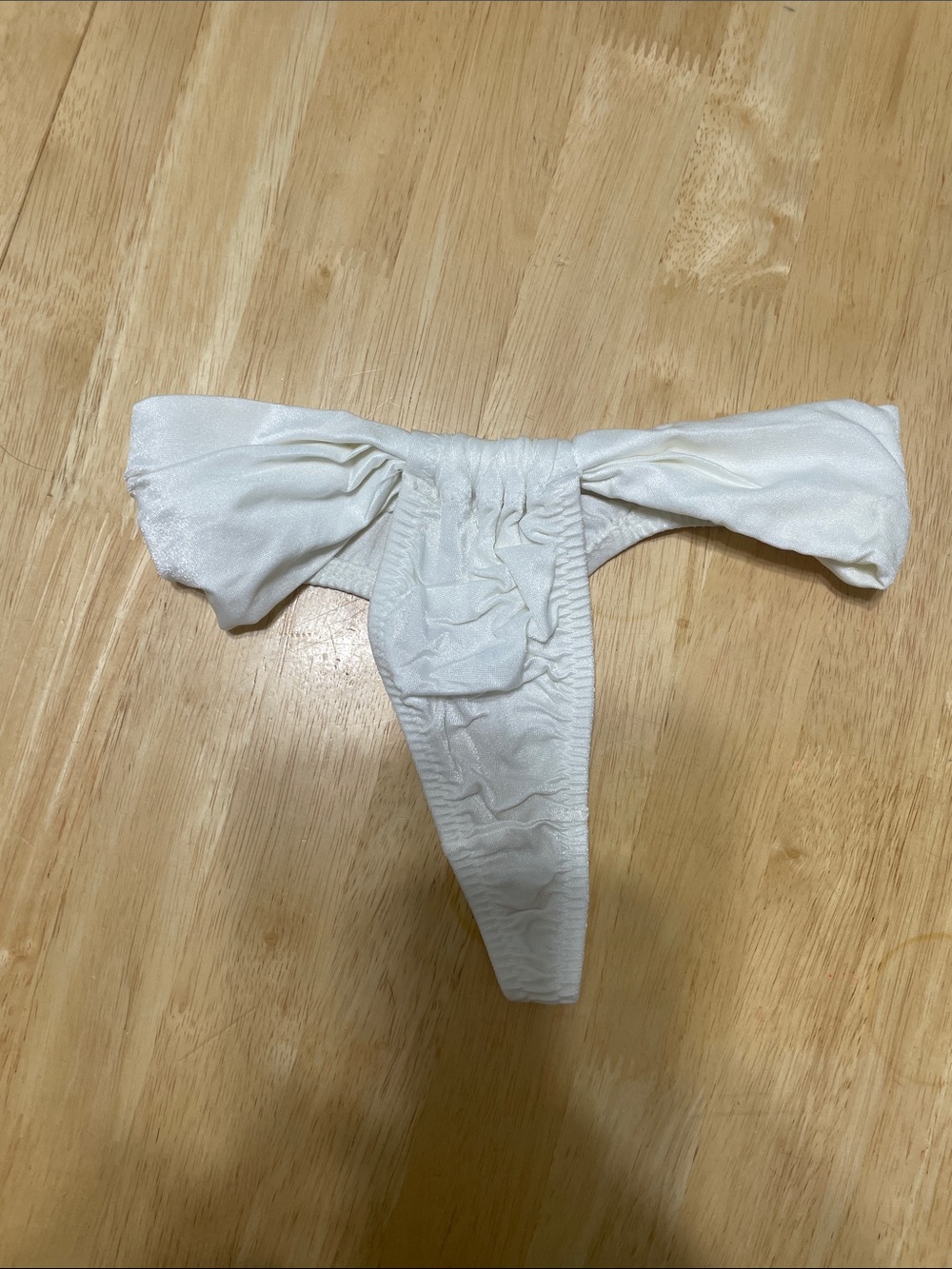 Elegant White Satin Thong with Bow Detail